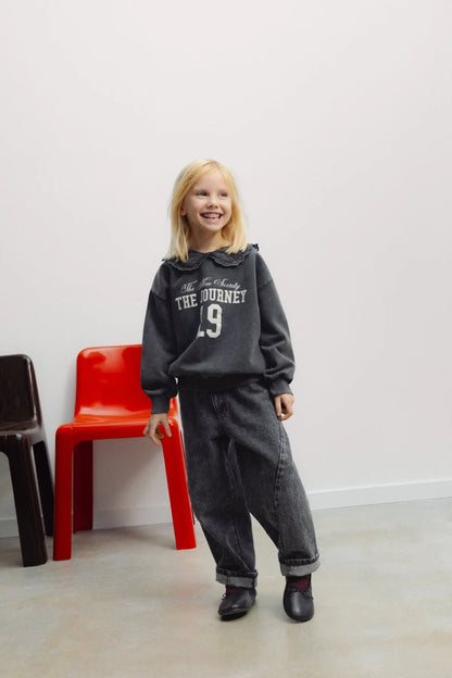 The New Society Girls Forged Iron Bluff Sweatshirt